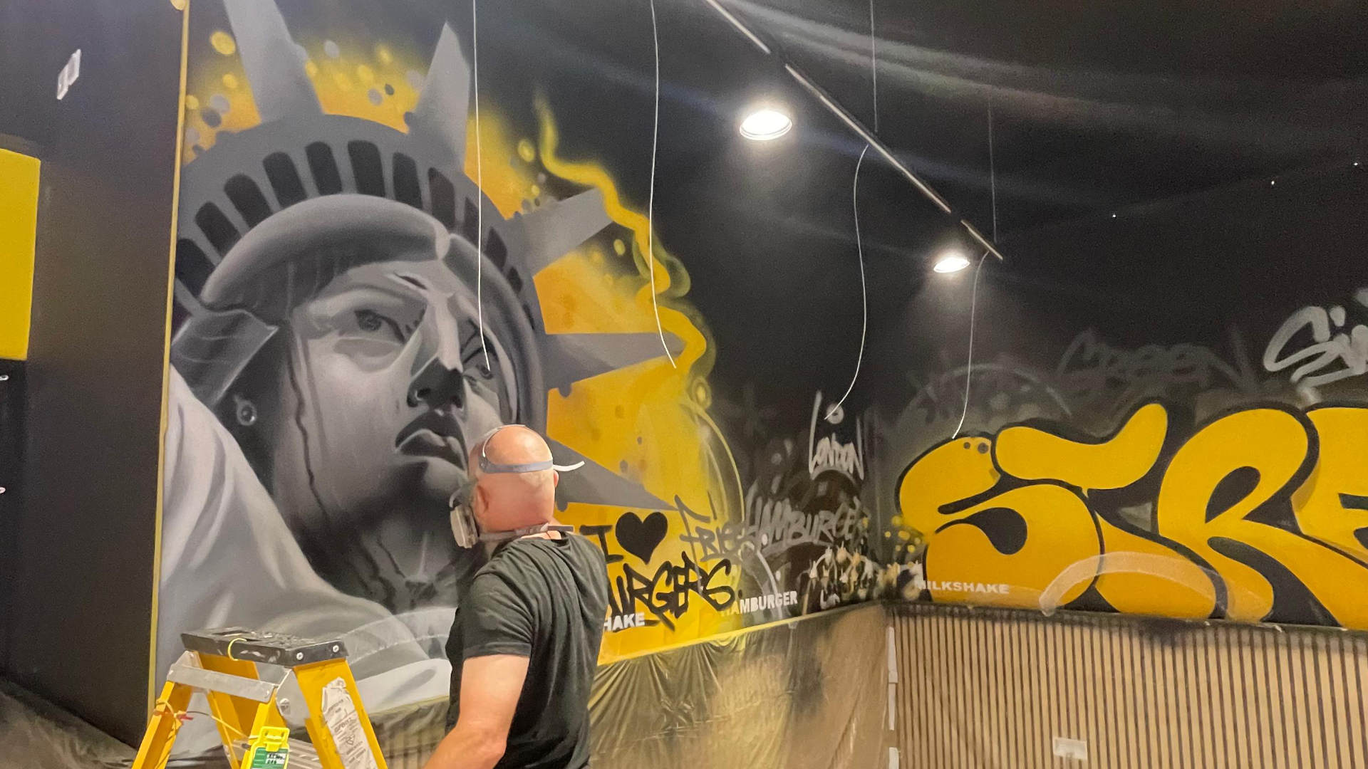 Fat Phills London Karski working on Mural