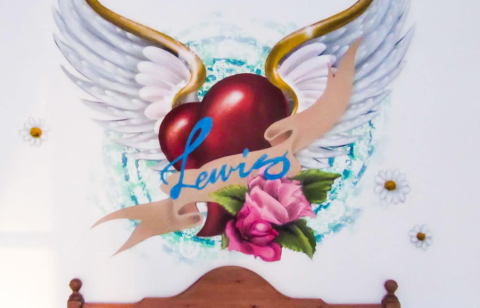Graffite naam op de muuur